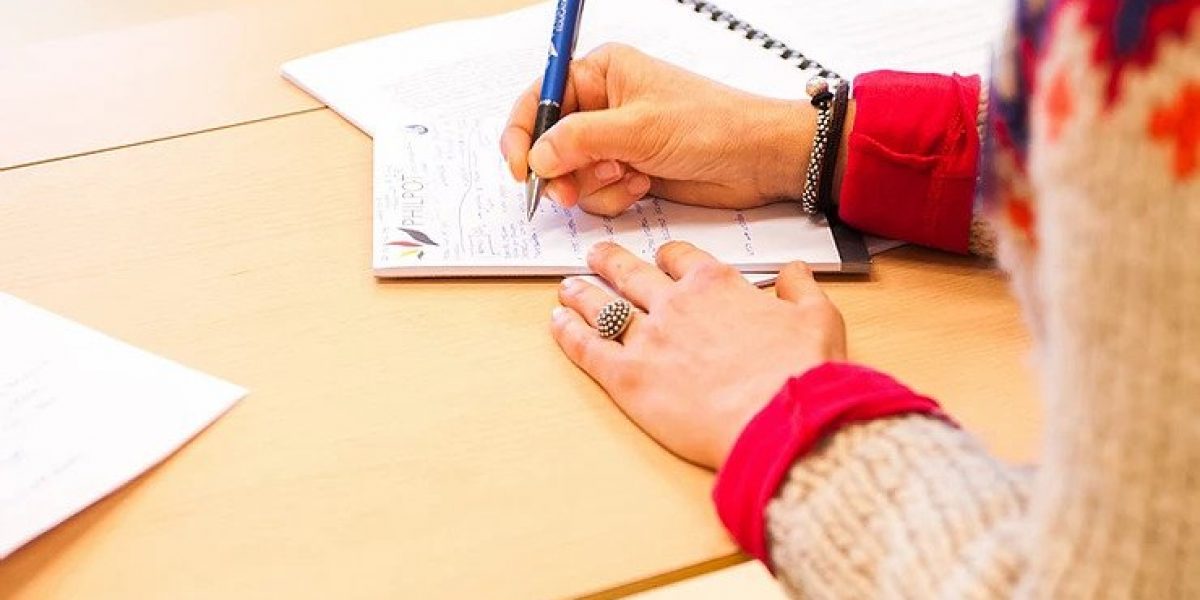woman writing notes